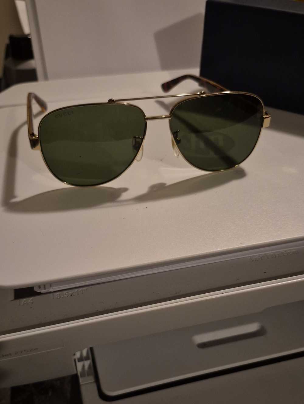 Gucci Gold Aviator Sunglasses with Green Lenses